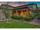 Inviting front porch with decorative columns and lush landscaping at 3929 E Bloomfield Pkwy, Gilbert, AZ 85296