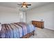 Bedroom showcasing neutral walls, carpet flooring, and a dark wood dresser at 4132 W Tunnel Mine Rd, New River, AZ 85087