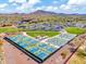 This neighborhood features a large pickleball complex for residents, with views of the surrounding desert landscape at 4132 W Tunnel Mine Rd, New River, AZ 85087