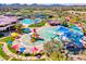 This extensive waterpark features a splash pad, waterslides, swimming pool, and lounging cabanas for the residents at 4132 W Tunnel Mine Rd, New River, AZ 85087