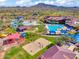 A complete waterpark featuring pools, slides, splash pads, and sand volleyball makes this neighborhood a fun community at 4132 W Tunnel Mine Rd, New River, AZ 85087