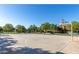 Outdoor basketball court surrounded by green trees and landscaping within the community at 4366 E Lexington Ave, Gilbert, AZ 85234