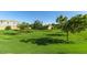 Expansive green space with mature trees offering shade, highlighting the community's outdoor amenities at 4366 E Lexington Ave, Gilbert, AZ 85234