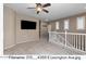 Upstairs loft area with neutral walls, carpeted flooring and lots of natural light at 4366 E Lexington Ave, Gilbert, AZ 85234