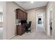 Hallway office featuring built-in cabinets and view of the bedrooms and hallway at 4366 E Lexington Ave, Gilbert, AZ 85234