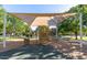 Community playground featuring covered play structure and mature trees offering shaded areas at 4366 E Lexington Ave, Gilbert, AZ 85234