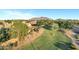 An aerial view showcases the well-maintained community park and stunning mountain views at 4493 E Desert Sands Dr, Chandler, AZ 85249