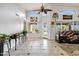 Open concept living room with high ceilings and tile flooring at 4493 E Desert Sands Dr, Chandler, AZ 85249