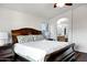 Large main bedroom with an ensuite bathroom, hardwood floors and natural light at 4493 E Desert Sands Dr, Chandler, AZ 85249