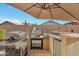 Outdoor kitchen boasts a built-in grill, and stainless steel cabinets for outdoor entertaining at 4493 E Desert Sands Dr, Chandler, AZ 85249