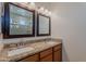 Bathroom vanity with dual sinks and granite countertop at 5026 E Sunstone Dr, San Tan Valley, AZ 85143