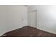 Bedroom featuring wood-look flooring and a sliding-door closet at 5026 E Sunstone Dr, San Tan Valley, AZ 85143