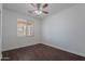 Neutral bedroom with wood floors, a ceiling fan, and natural light at 5026 E Sunstone Dr, San Tan Valley, AZ 85143