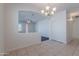 Open-concept dining area features tile floors, and is open to the living room at 5026 E Sunstone Dr, San Tan Valley, AZ 85143