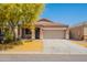 Charming single-story home with a well-maintained yard and inviting curb appeal under a clear blue sky at 5026 E Sunstone Dr, San Tan Valley, AZ 85143