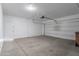 Clean and spacious two-car garage provides ample parking with a functional automatic door at 5026 E Sunstone Dr, San Tan Valley, AZ 85143