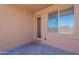Back patio provides a shaded outdoor living space with a view of the backyard at 5026 E Sunstone Dr, San Tan Valley, AZ 85143