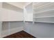Organized walk-in closet with shelving and hanging rods at 5026 E Sunstone Dr, San Tan Valley, AZ 85143