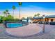 Pool with a covered patio and expansive desert landscaping at 5402 E Larkspur Dr, Scottsdale, AZ 85254