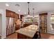 Gourmet kitchen with granite countertops, stainless appliances, and lots of natural light at 5402 E Larkspur Dr, Scottsdale, AZ 85254