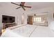 Spacious main bedroom features a ceiling fan, mirrored closet, and comfortable furnishings at 5402 E Larkspur Dr, Scottsdale, AZ 85254
