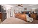 Comfortable main bedroom with ceiling fan, furnishings, and ensuite bathroom at 5402 E Larkspur Dr, Scottsdale, AZ 85254
