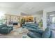Spacious living room with natural light, tile flooring, and direct access to the kitchen and outdoor patio at 7486 E Bajada Rd, Scottsdale, AZ 85266