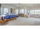 Bright and airy main bedroom with large windows, ample seating, and comfortable furnishings at 7486 E Bajada Rd, Scottsdale, AZ 85266
