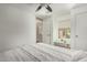 This bedroom features a window view and a closet with a double door at 7722 W Pipestone Pl, Phoenix, AZ 85035