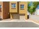 Front exterior view of this building featuring two stories and a two car garage at 7722 W Pipestone Pl, Phoenix, AZ 85035