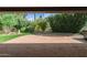 Inviting backyard with large brick patio and lush landscaping at 8943 N 80Th Pl, Scottsdale, AZ 85258