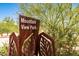 Rustic Mountain View Park sign surrounded by desert landscaping and native trees at 8943 N 80Th Pl, Scottsdale, AZ 85258