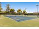 Well-maintained community tennis courts with professional surfacing and tall net fencing at 8943 N 80Th Pl, Scottsdale, AZ 85258
