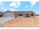 Charming single-story home featuring a gray facade, attached garage, and desert landscaping at 9280 W Wenden Dr, Arizona City, AZ 85123