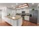 Granite counters and stainless appliances adorn this bright and modern kitchen at 100 E Geneva Dr, Tempe, AZ 85282