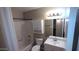 Bathroom with tub and shower combo, white vanity, and mirror at 1033 S Florence Dr, Mesa, AZ 85208