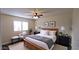 Inviting bedroom features a well-lit space with modern decor, chair, and a comfortable bed at 1033 S Florence Dr, Mesa, AZ 85208