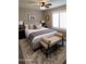Comfortable bedroom features a cozy bed with neutral tones, shutters, and complementary decor at 1033 S Florence Dr, Mesa, AZ 85208