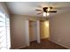 Bedroom featuring a closet, neutral carpet, and tan walls at 1033 S Florence Dr, Mesa, AZ 85208