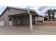 Attached carport offering ample parking space and protection from the elements at 1033 S Florence Dr, Mesa, AZ 85208