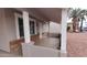 Inviting front porch with classic brick accents, offering curb appeal at 1033 S Florence Dr, Mesa, AZ 85208