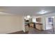 Kitchen and dining room with hard surface flooring and stainless steel appliances at 1033 S Florence Dr, Mesa, AZ 85208