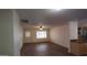 Inviting living area features vinyl floors, large windows, and neutral paint palette at 1033 S Florence Dr, Mesa, AZ 85208