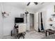 Bedroom with neutral paint, a modern desk area, and walk-in closet at 10752 W Rio Vista Ln, Avondale, AZ 85323