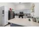 Bright kitchen with white cabinets, stainless steel appliances, and a functional layout for cooking at 10752 W Rio Vista Ln, Avondale, AZ 85323