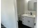 Elegant half bathroom with modern fixtures and sleek quartz countertop at 10910 N Thunderbird Rd, Maricopa, AZ 85139
