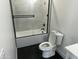 Modern bathroom featuring a tub and shower with black trim at 10910 N Thunderbird Rd, Maricopa, AZ 85139