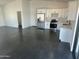 Modern kitchen featuring stainless steel appliances and bright white cabinetry and countertops at 10910 N Thunderbird Rd, Maricopa, AZ 85139