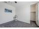 Bedroom featuring neutral walls, plush carpeting, and decorative furniture at 12048 E Chevelon Trl, Gold Canyon, AZ 85118