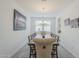 Dining room featuring a chandelier, large table, and seating for ten at 12048 E Chevelon Trl, Gold Canyon, AZ 85118